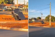 Carro invade rotatória e cai em galeria pluvial na Avenida Emílio Arroyo Hernandes