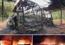 Polícia investiga incêndio criminoso em ônibus após câmera flagrar homem pulando portão com galão