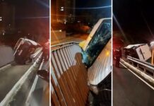 Motorista perde controle e veículo furgão fica pendurado em grade de viaduto