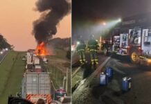 Caminhão carregado com óleo pega fogo e chamas se espalham por vegetação às margens de rodovia